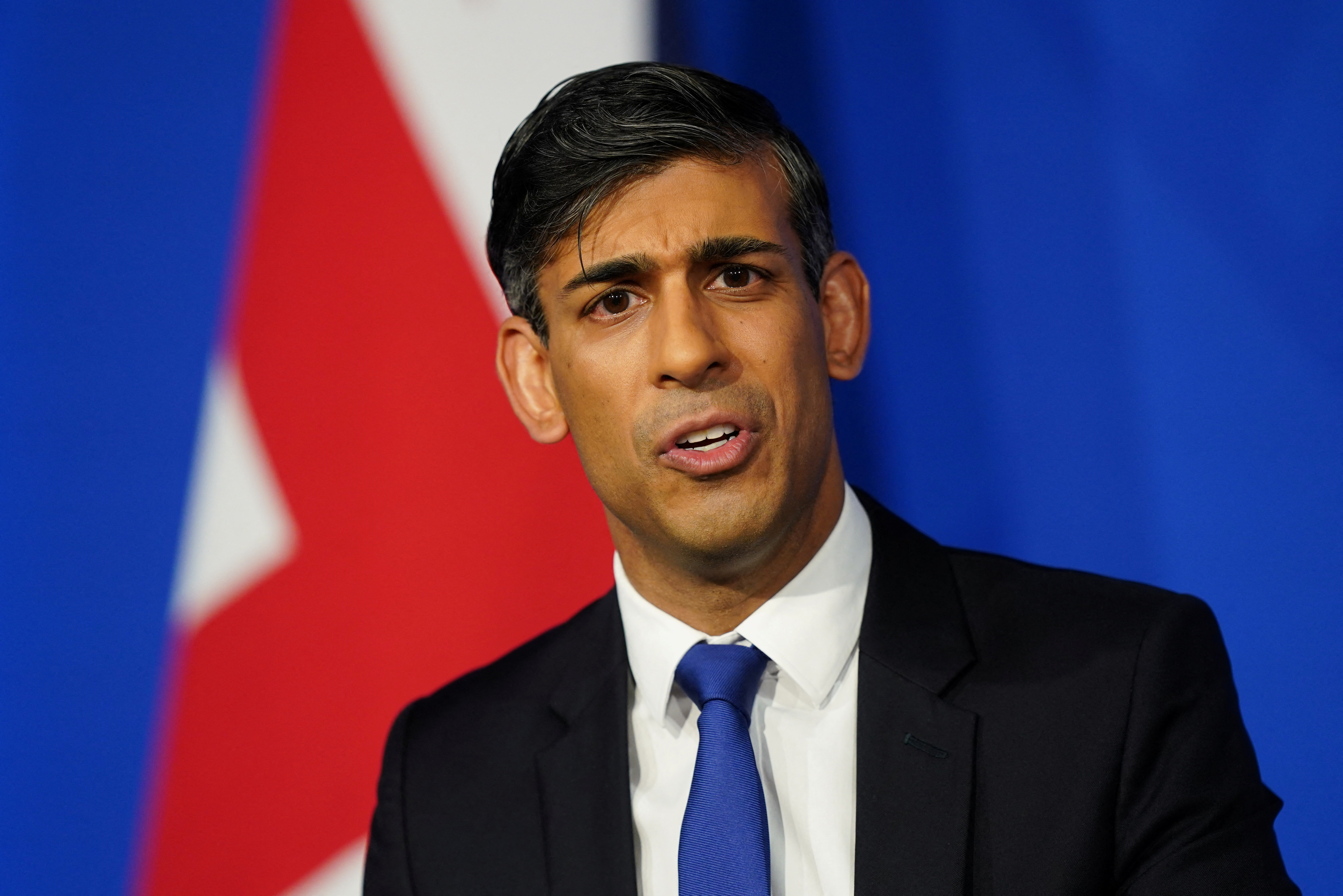 Rishi Sunak attends a press conference in the Downing Street Briefing Room