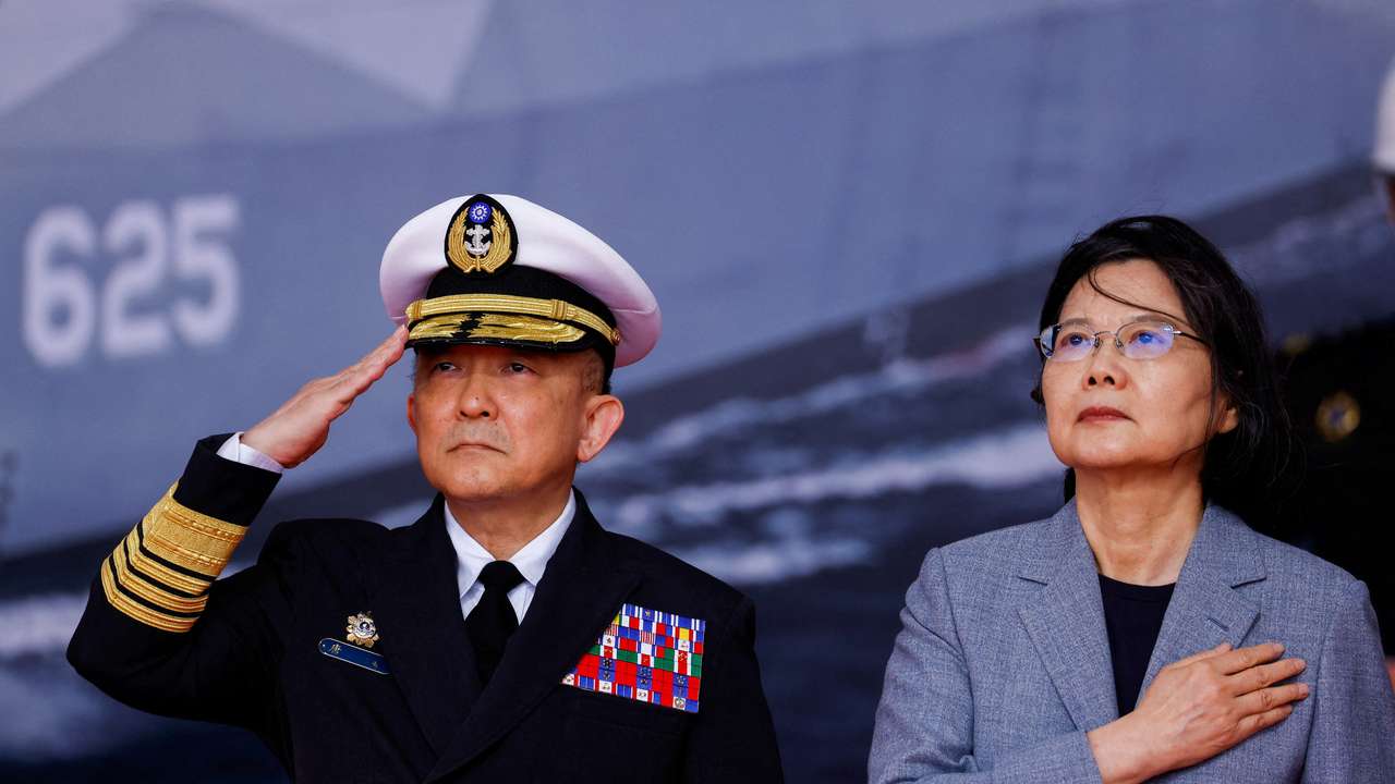 FILE PHOTO: Taiwan President Tsai Ing-wen and Taiwan Navy Commander Tang Hua attend the delivery ceremony of six made-in-Taiwan Tuo Chiang-class corvettes at a port in Yilan