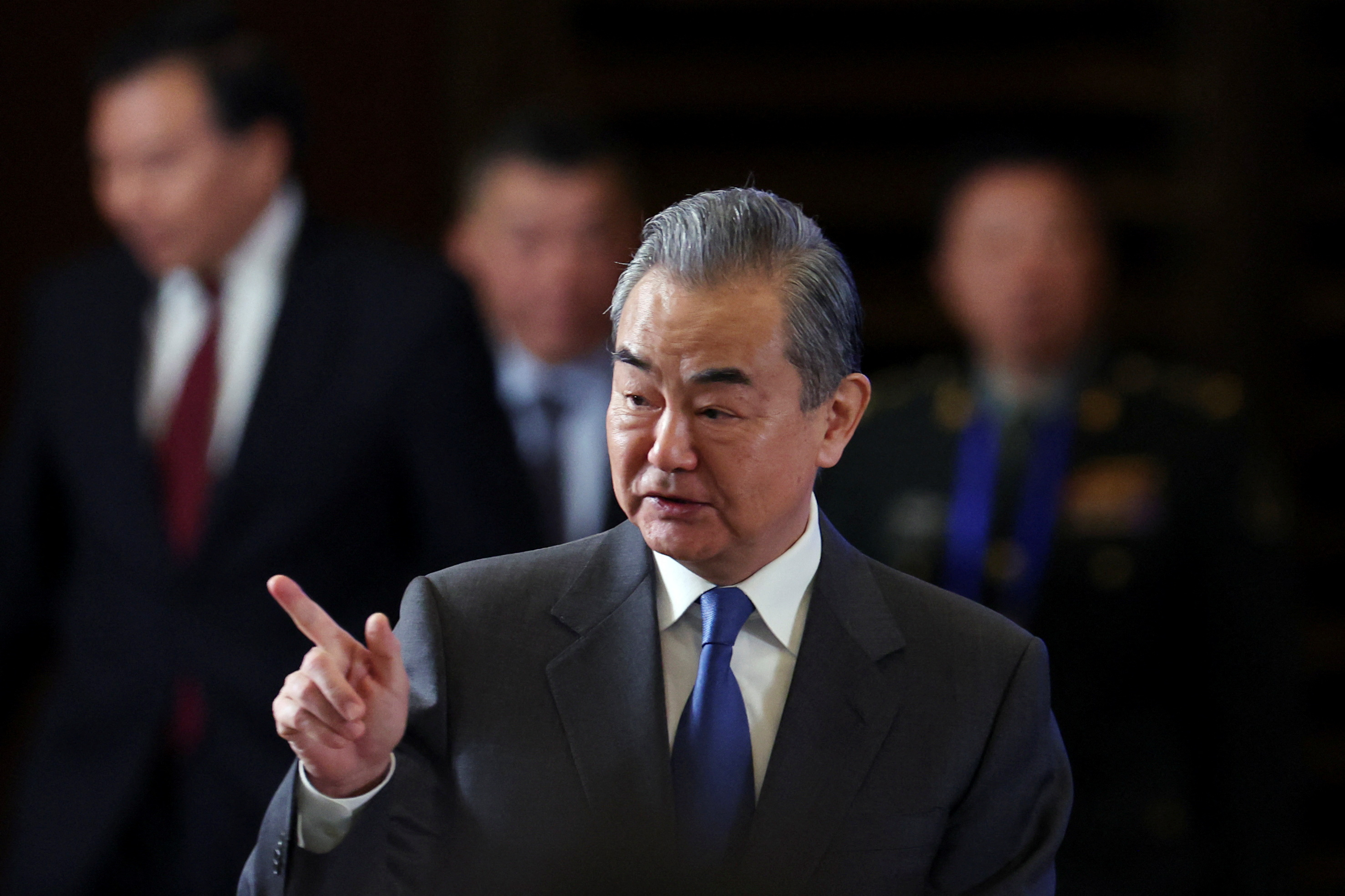 FILE PHOTO: Chinese Foreign Minister Wang Yi speaks at a seminar in Beijing