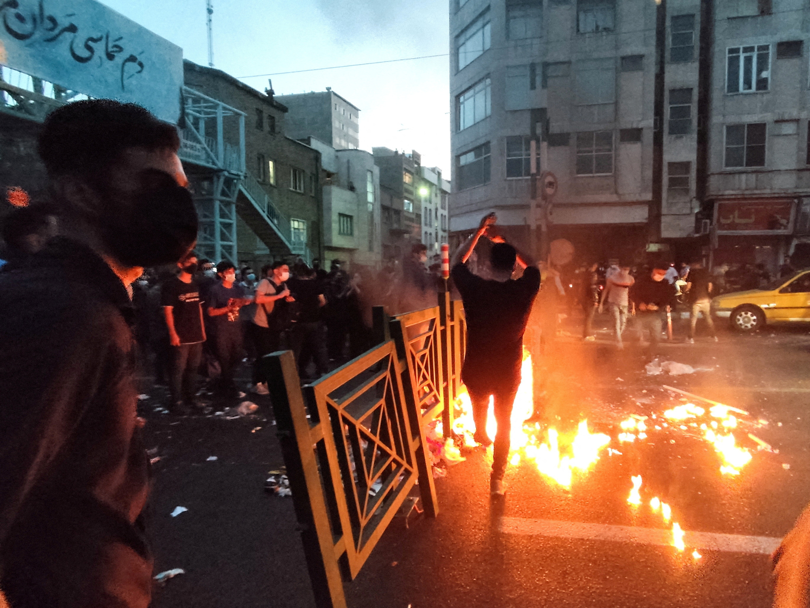 FILE PHOTO: Protest over the death of Mahsa Amini, a woman who died after being arrested by the Islamic republic's "morality police", in Tehran
