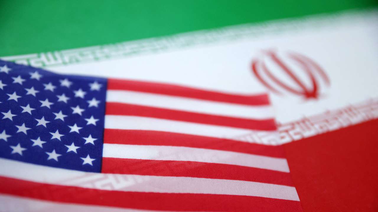 Illustration shows U.S. and Iran flags