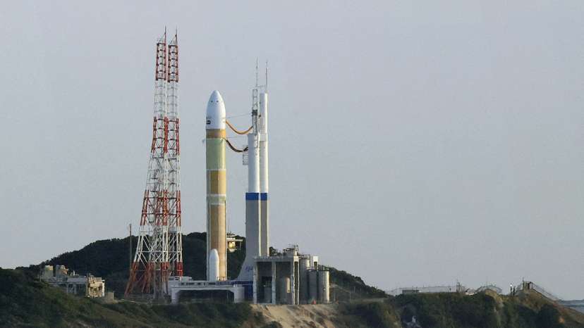 FILE PHOTO: An H3 rocket carrying a land observation satellite is seen before its launch at the Tanegashima Space Center, Japan