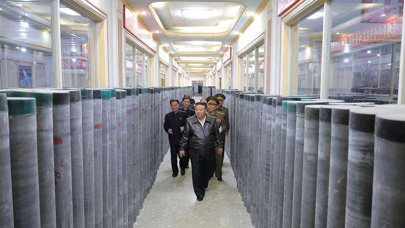 North Korea's leader Kim Jong Un visits a factory that makes shells and machinery