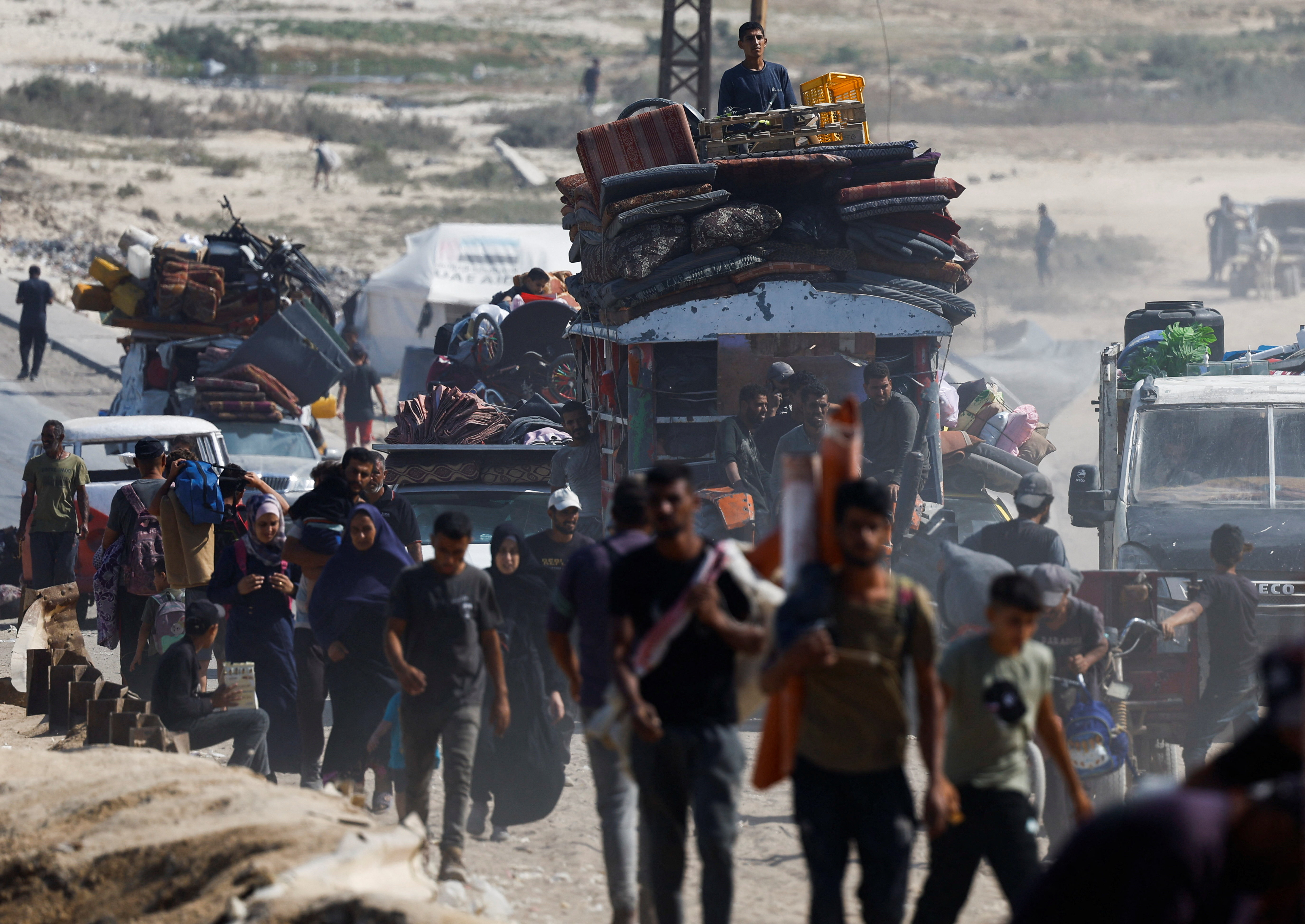 Displaced Palestinians fleeing northern Gaza due to an Israeli military operation, move southward, in the central Gaza Strip