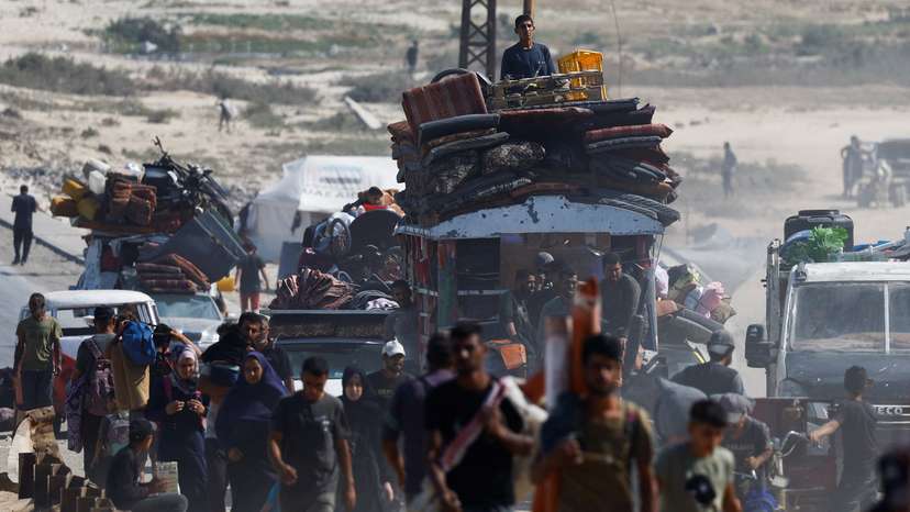 Displaced Palestinians fleeing northern Gaza due to an Israeli military operation, move southward, in the central Gaza Strip