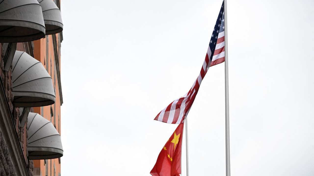 A U.S. and Chinese flag flutter outside Sweden's government offices "Rosenbad" in Stockholm