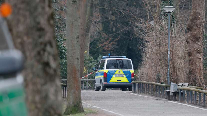 German police secures a park, where earlier today two people were killed in a knife attack