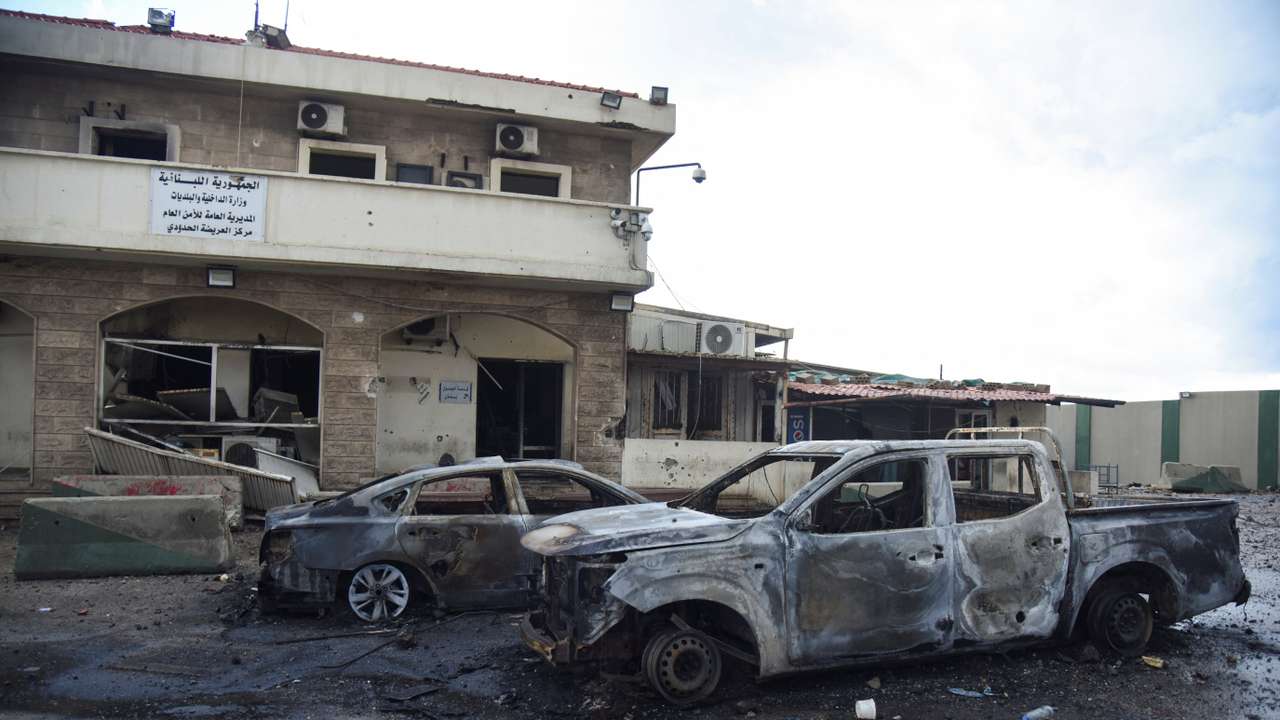 A view shows damaged cars at the Lebanese-Syrian border crossing of Arida following an Israeli strike that occurred late on Tuesday
