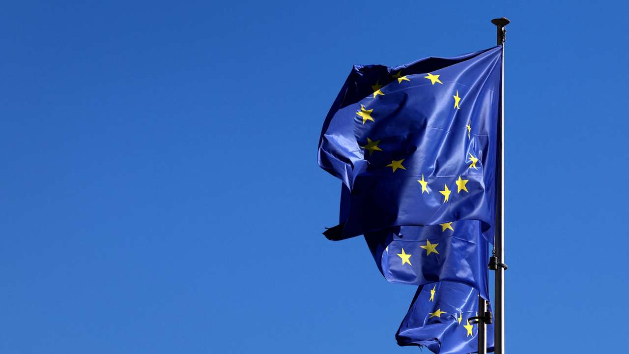 European Union flags flutter outside the EU Commission headquarters in Brussels