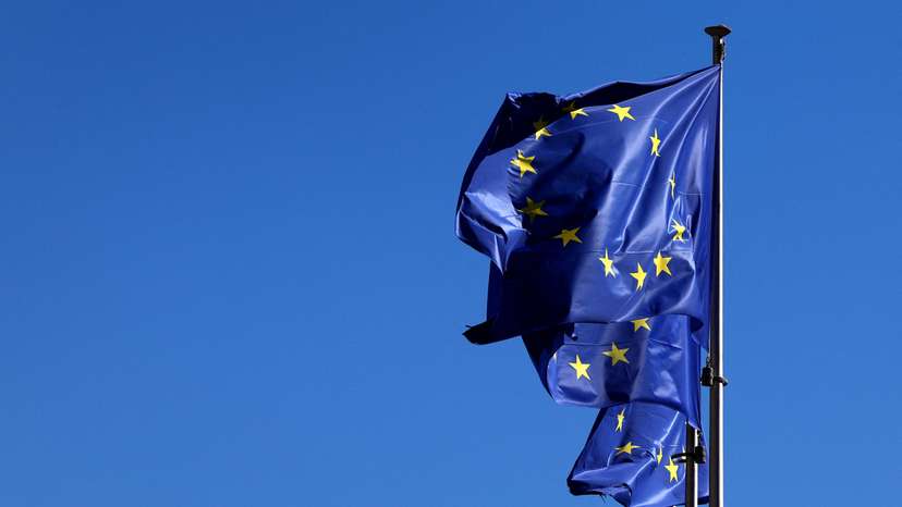 European Union flags flutter outside the EU Commission headquarters in Brussels