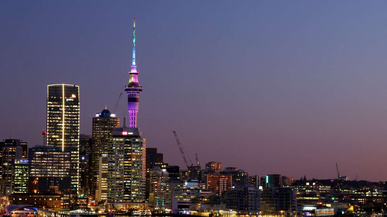 FILE PHOTO: Auckland, New Zealand - August 3, 2023 General view of the Auckland skyline at sunset