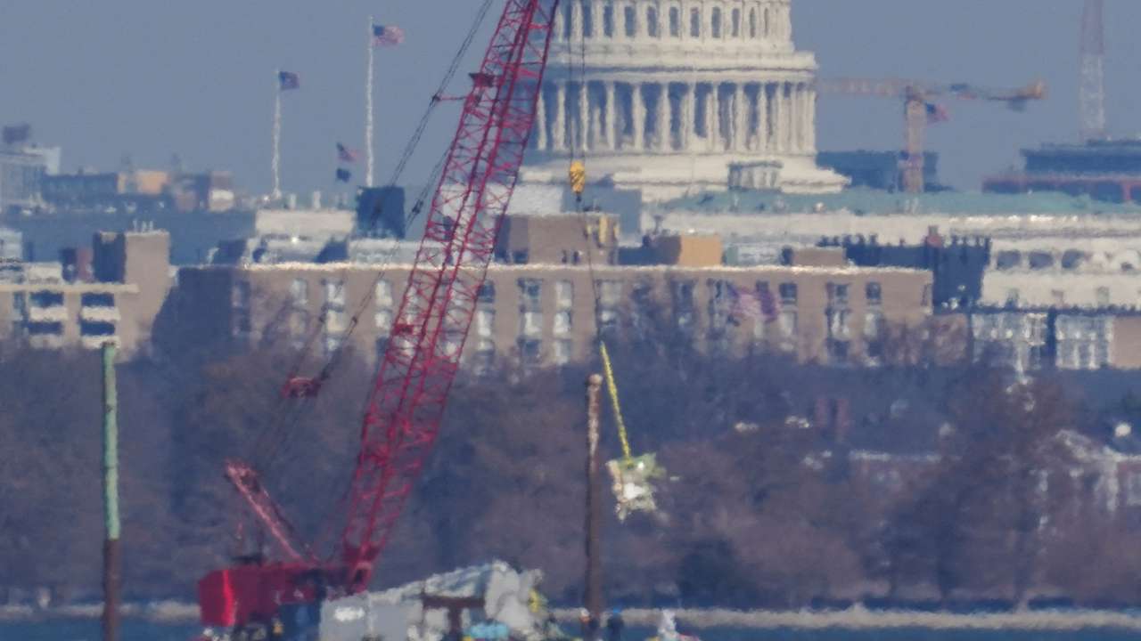 FILE PHOTO: Aftermath of American Eagle flight 5342 crash in the Potomac River near Ronald Reagan Washington National Airport