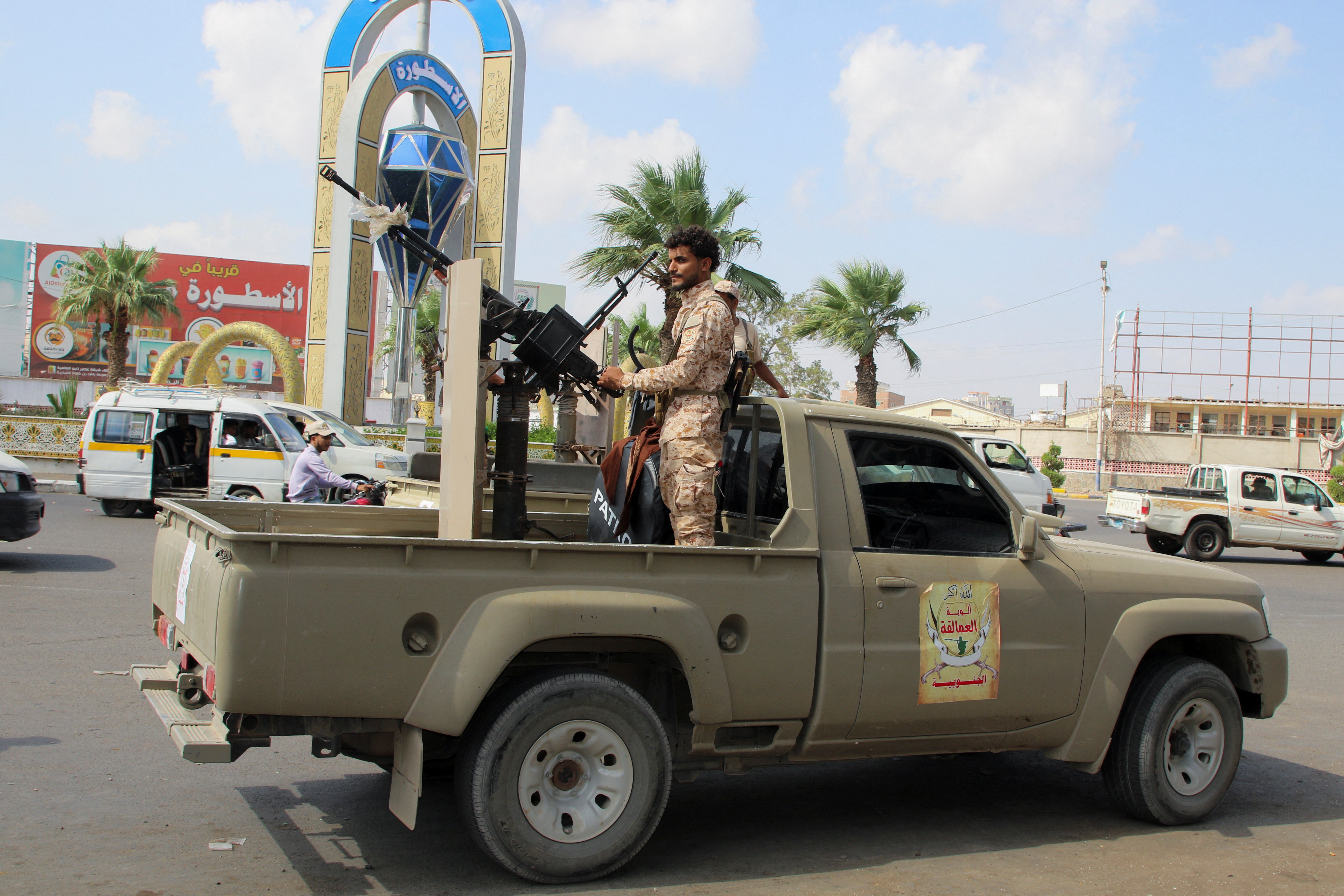 A member of the Giants Forces mans a machine gun on a patrol truck amid the southern crisis in Aden