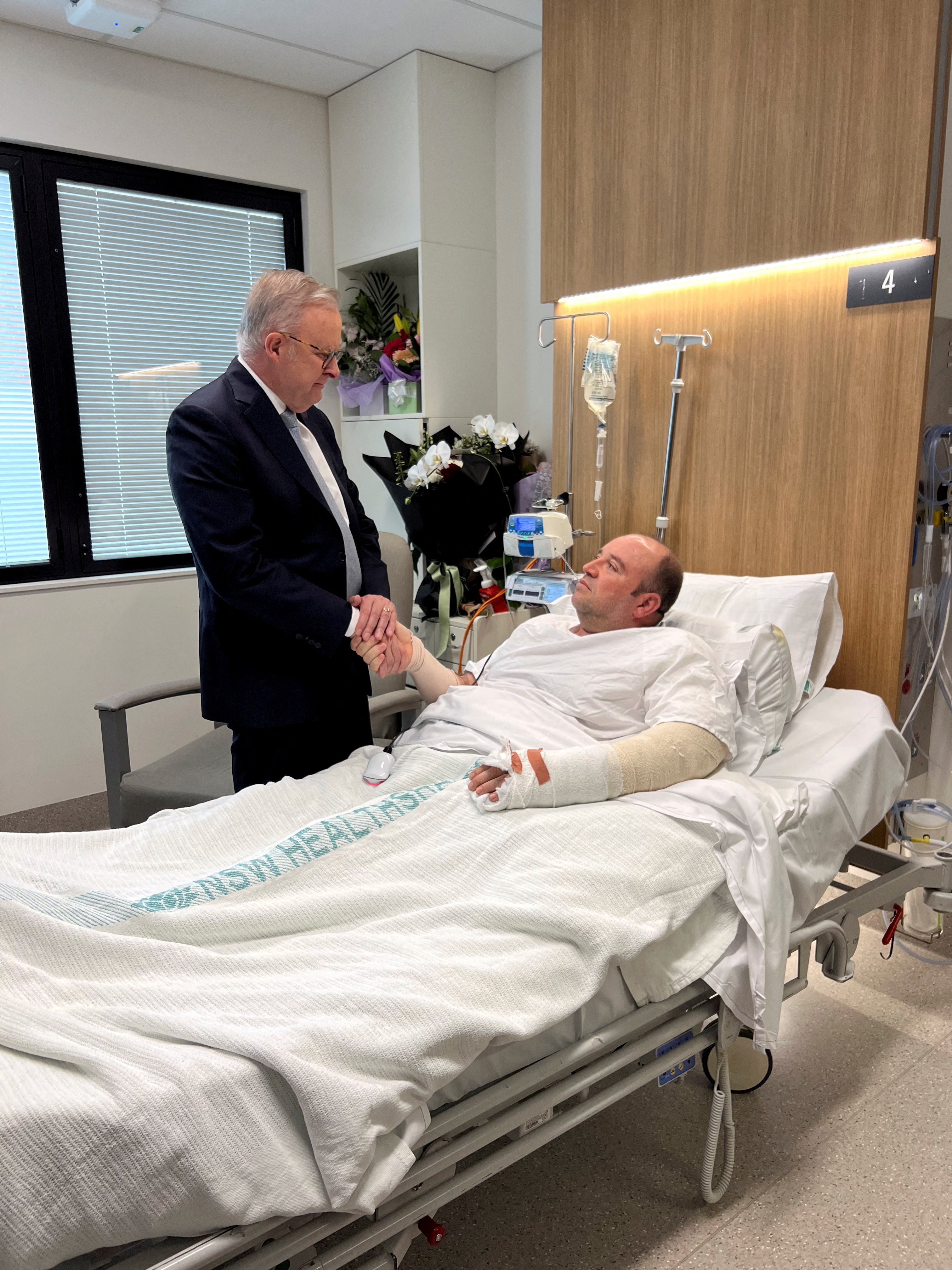 Australia's Prime Minister Anthony Albanese visits Ahmed al Ahmed at the hospital, in Sydney