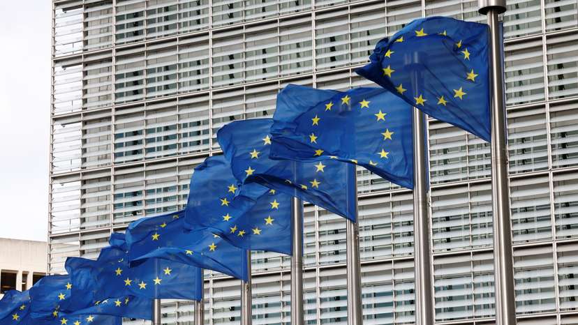 European Union flags flutter outside the EU Commission headquarters in Brussels