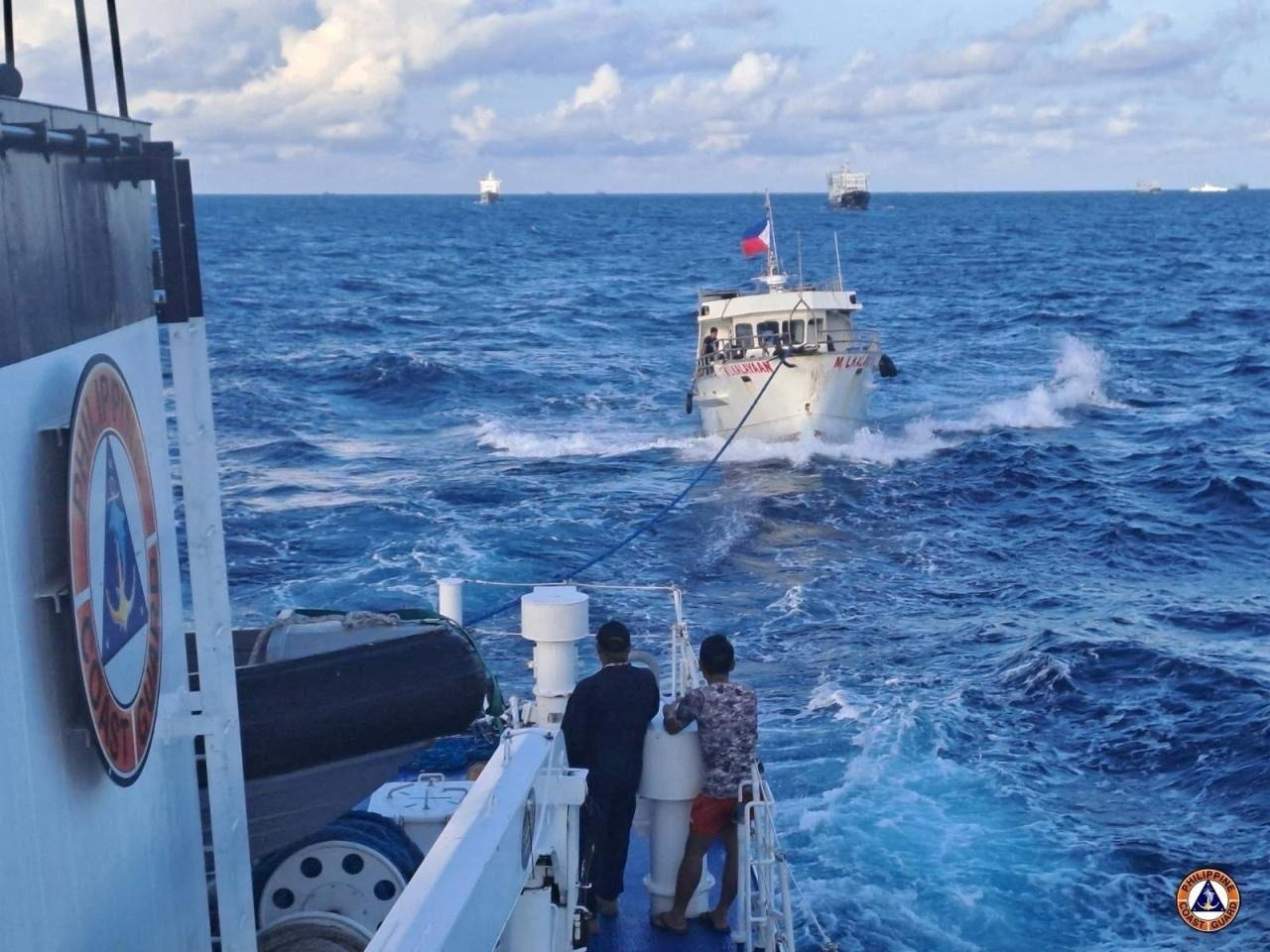 FILE PHOTO: Chinese Coast Guard ship uses water cannon against a Filipino resupply vessel