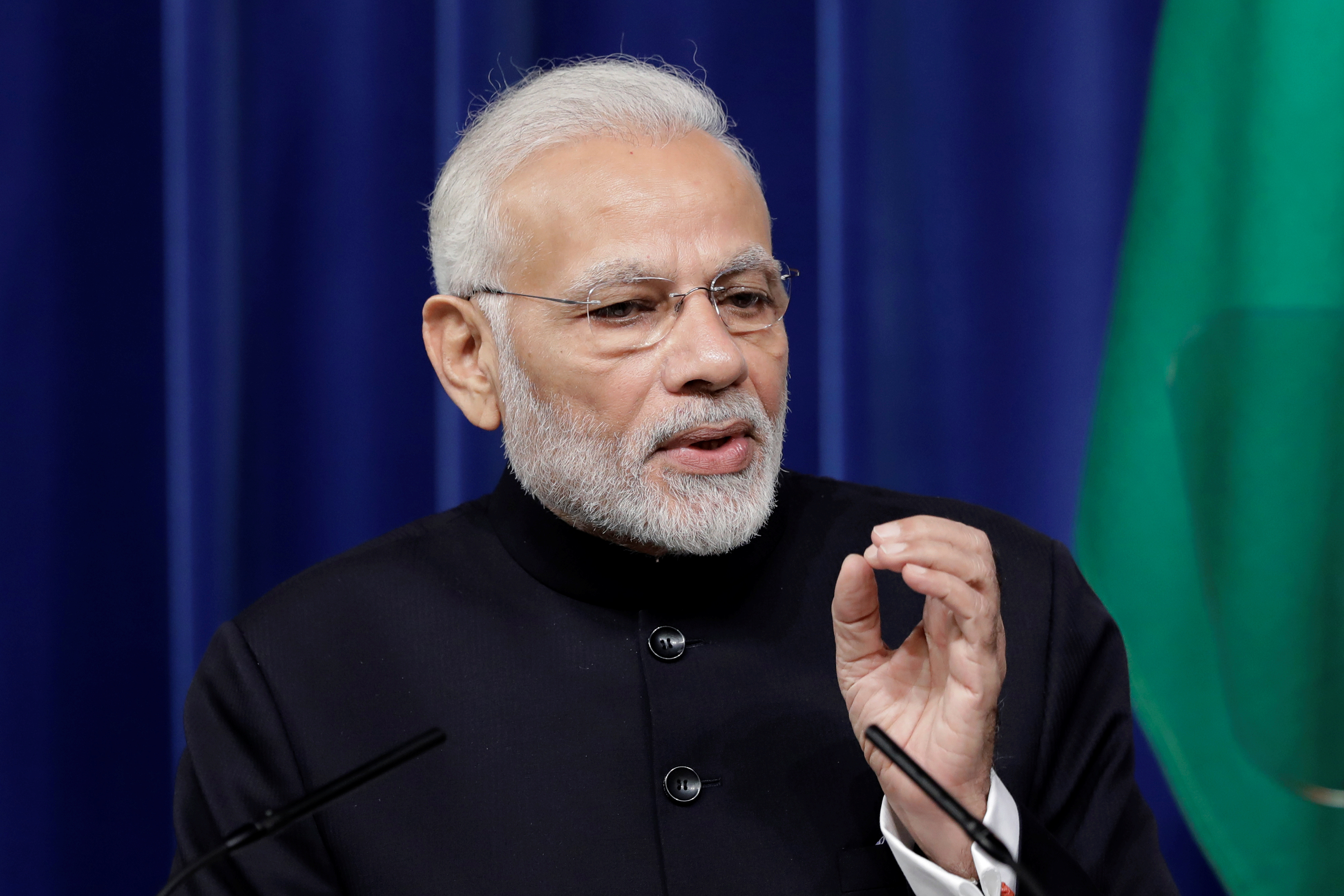 Narendra Modi, India's prime minister, speaks during a joint news conference with Shinzo Abe, Japan's prime minister, not pictured, at Abe's official residence in Tokyo