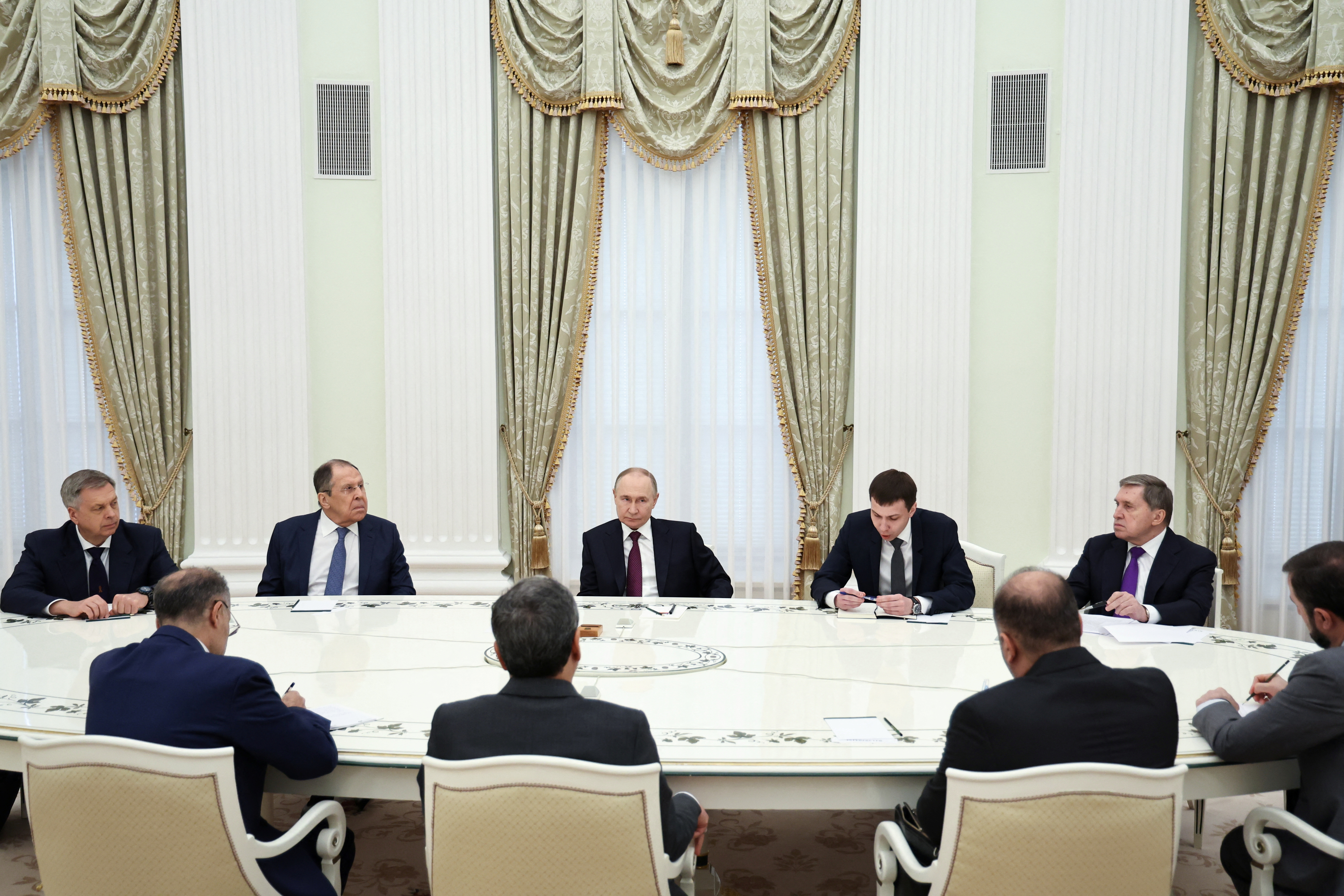 Russian President Vladimir Putin meets with Iranian Foreign Minister Abbas Araqchi in Moscow
