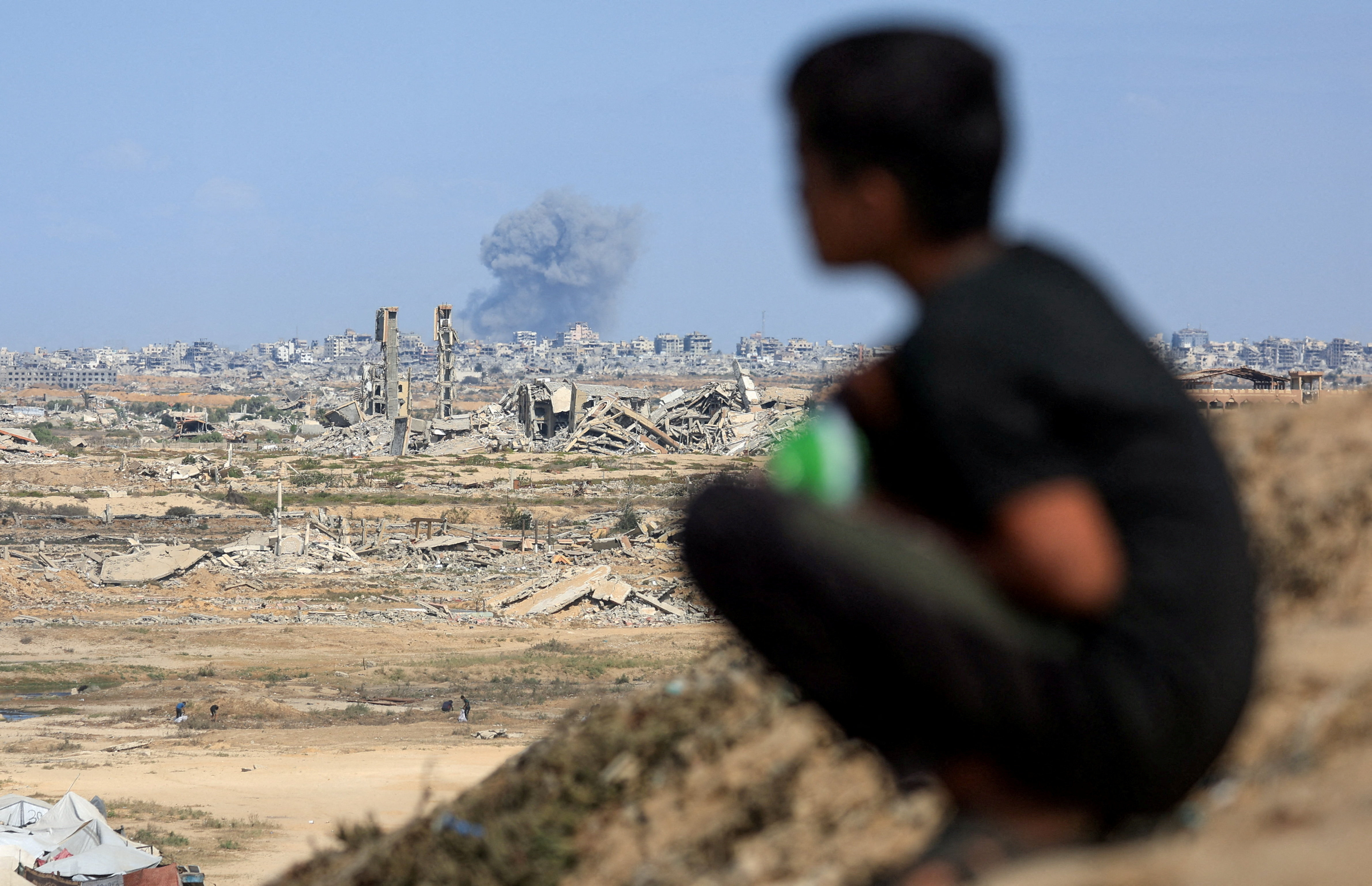 Smoke rises following explosions amid Israeli offensive in Gaza City, as seen from central Gaza Strip