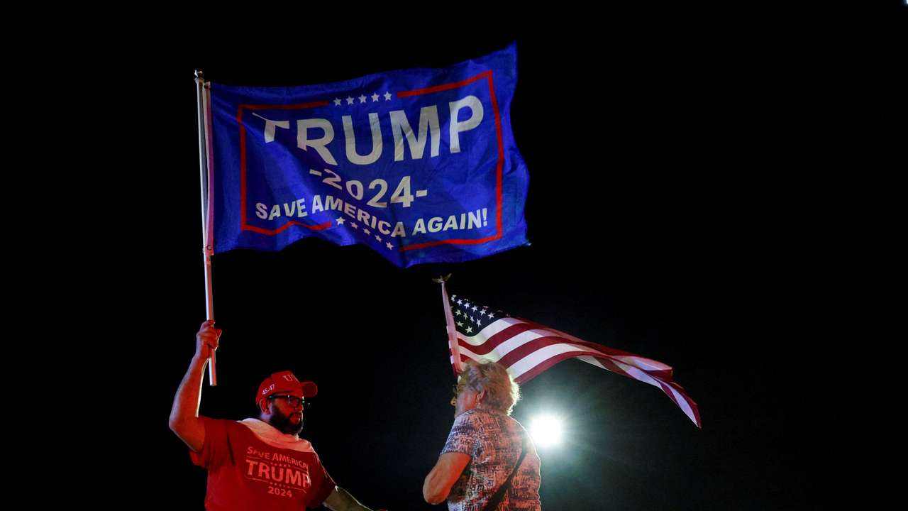People gather after Republican presidential candidate and former U.S. President Donald Trump was injured when shots were fired, in Palm Beach