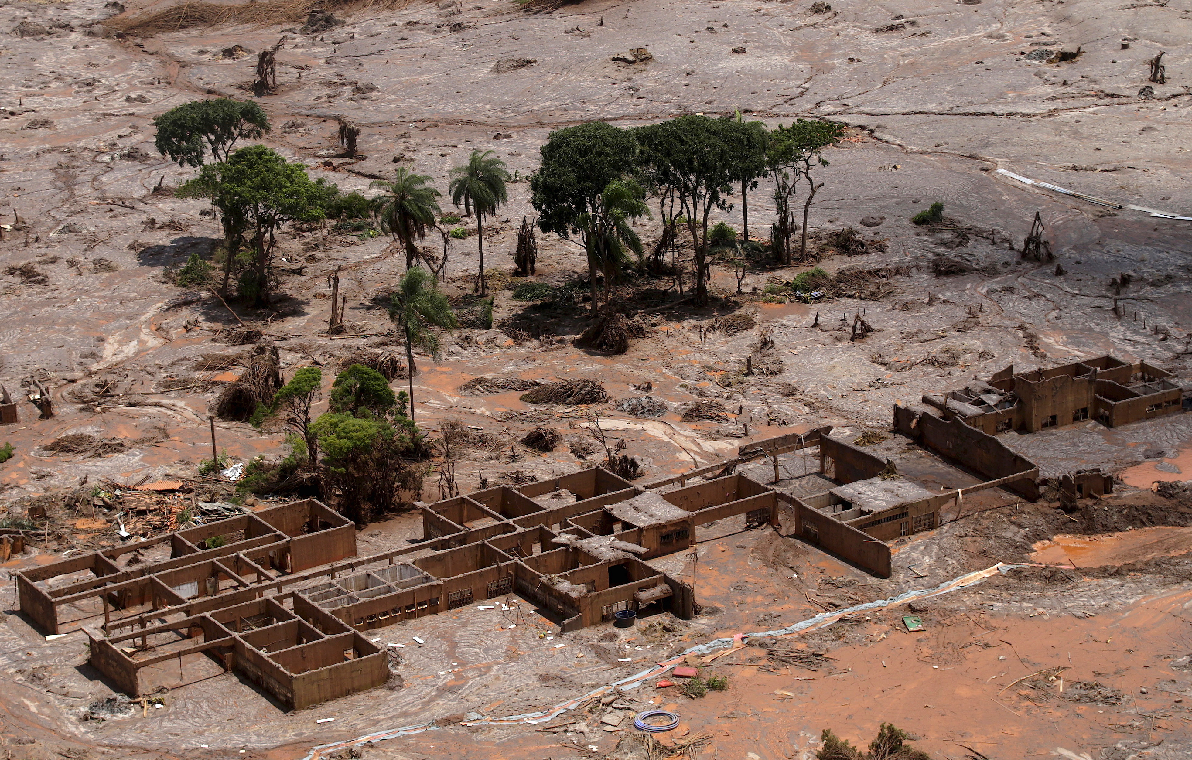 The debris of the municipal school of Bento Rodrigues district, which was covered with mud after a dam owned by Vale SA and BHP Billiton Ltd burst, is pictured in Mariana
