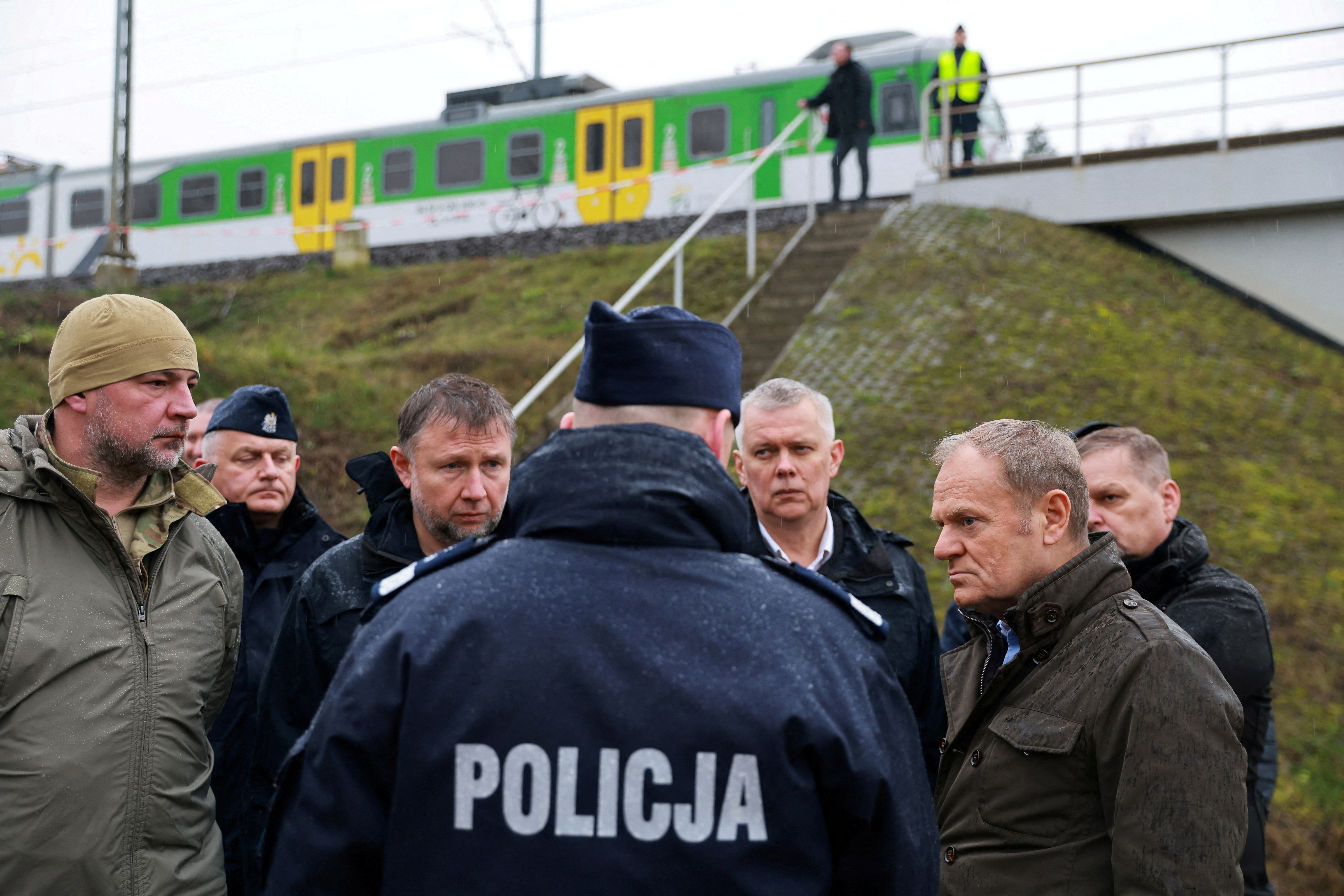 FILE PHOTO: Polish PM Tusk visits blast site on railways of Warsaw-Lublin line in Mika
