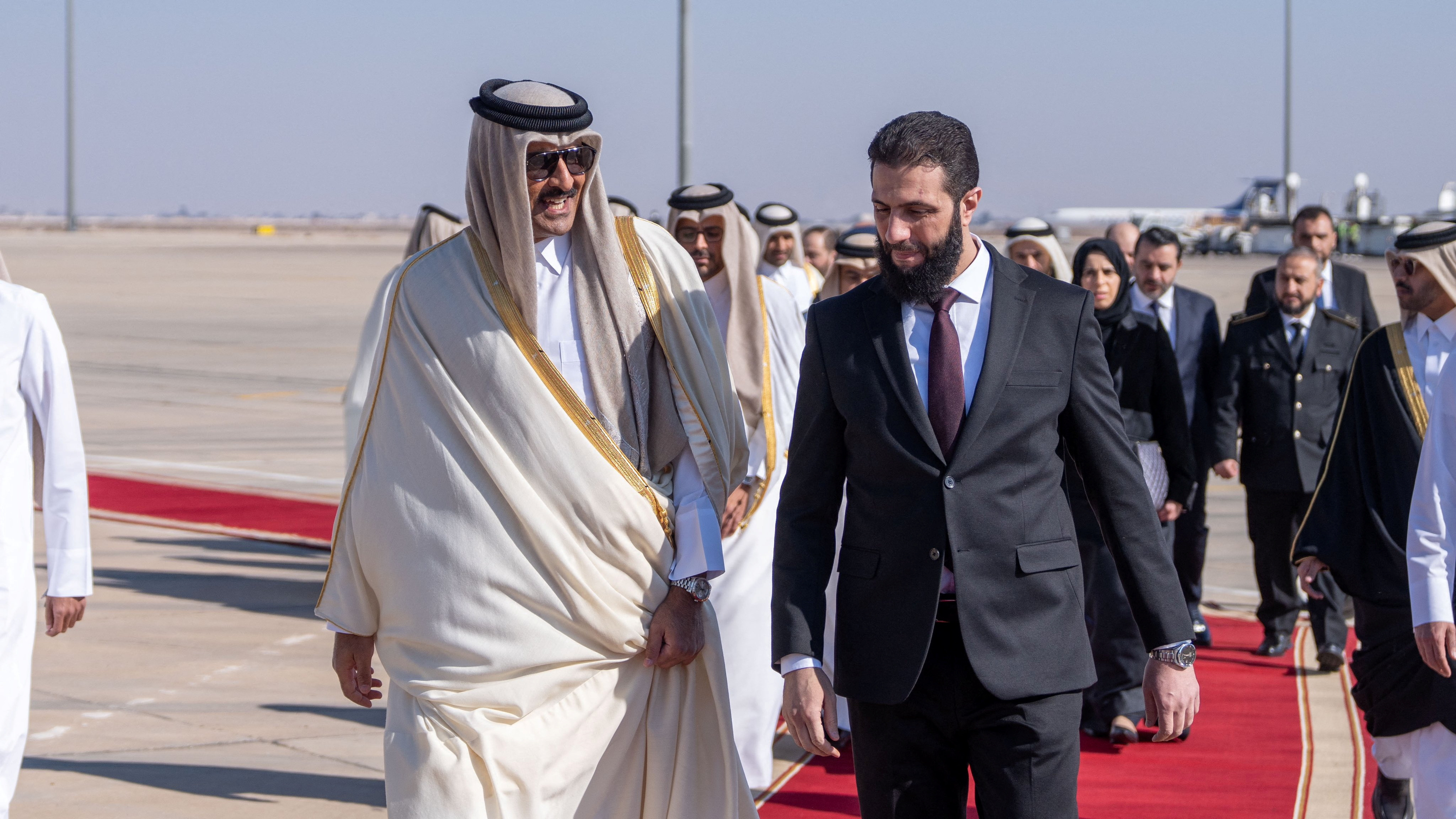 Syria's newly appointed president for a transitional phase Ahmed al-Sharaa receives Emir of Qatar Sheikh Tamim bin Hamad Al Thani in Damascus, Syria