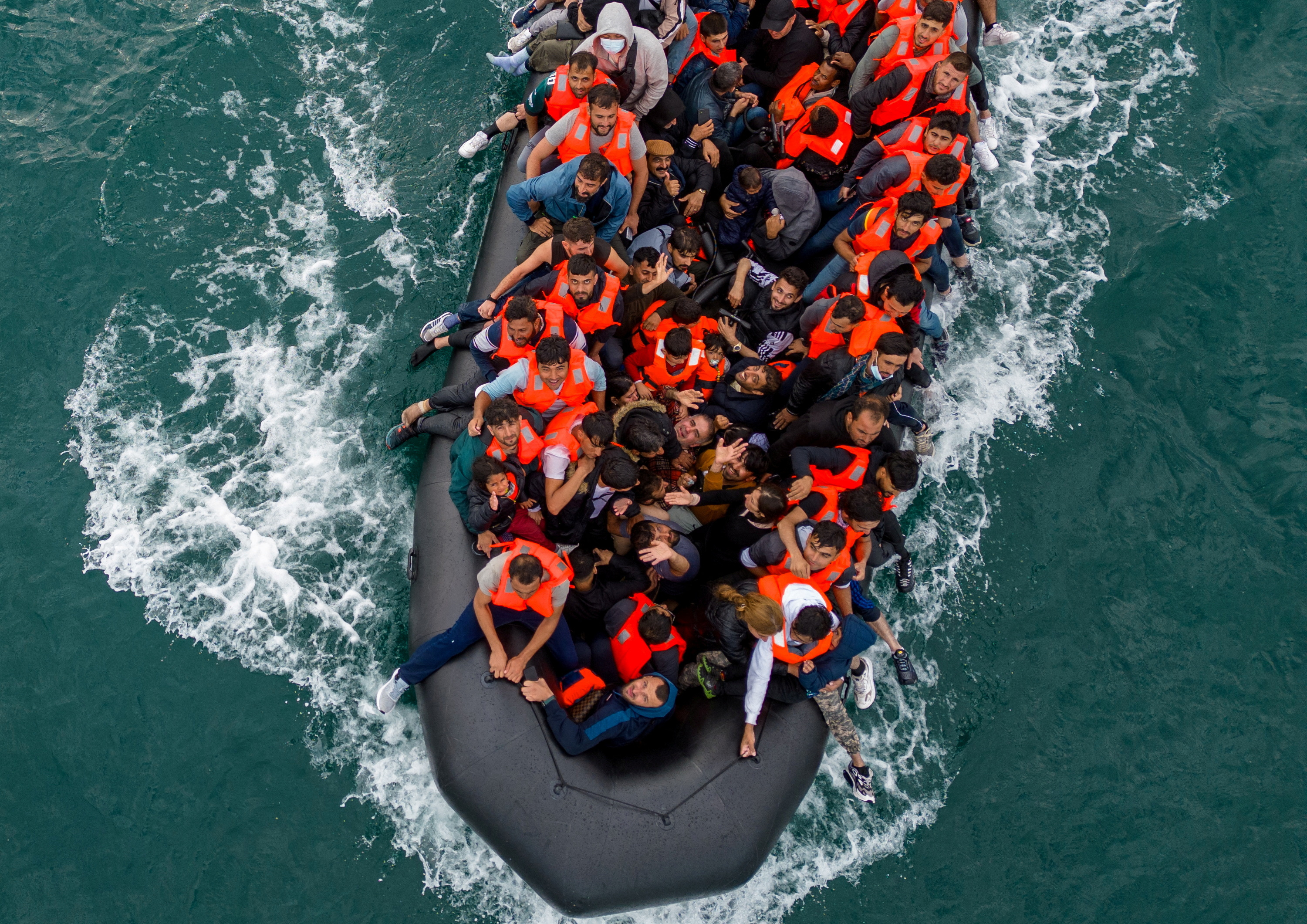 FILE PHOTO: Migrants cross the English Channel in small boats