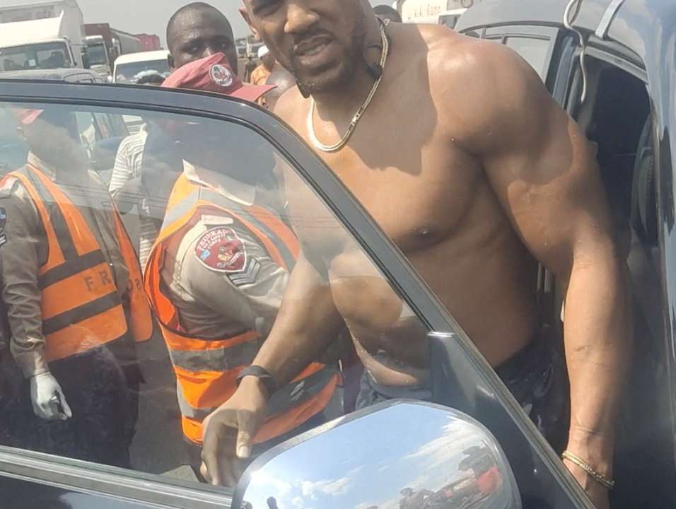 British boxer Anthony Joshua gets into an emergency responders' vehicle after being involved in a car crash in Nigeria's Ogun State