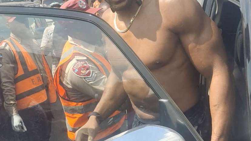 British boxer Anthony Joshua gets into an emergency responders' vehicle after being involved in a car crash in Nigeria's Ogun State