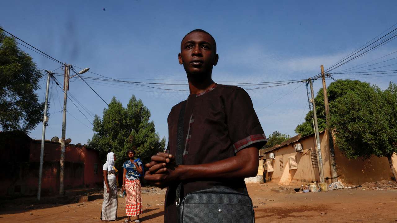 The Wider Image: From France to Mali, a deportee's struggle far from home