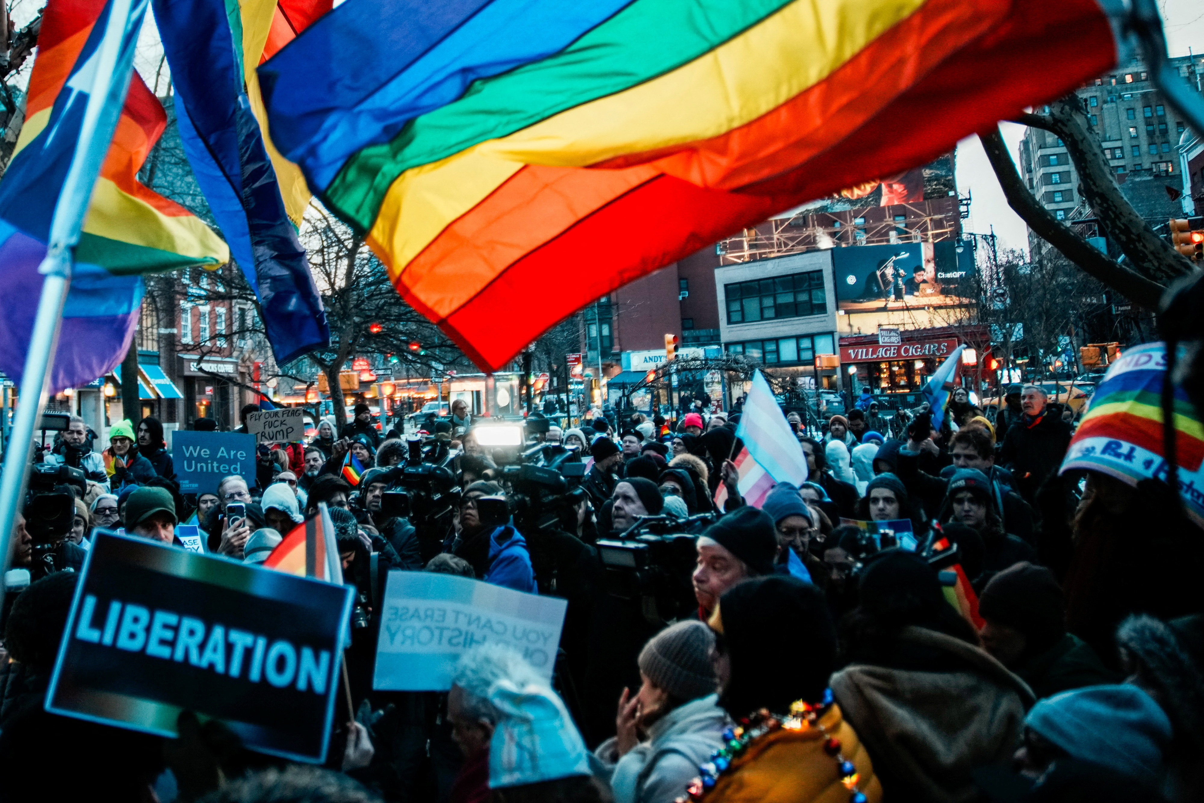 People gather at the Stonewall National Monument after authorities removed the Pride flag from the Greenwich Village site in New York