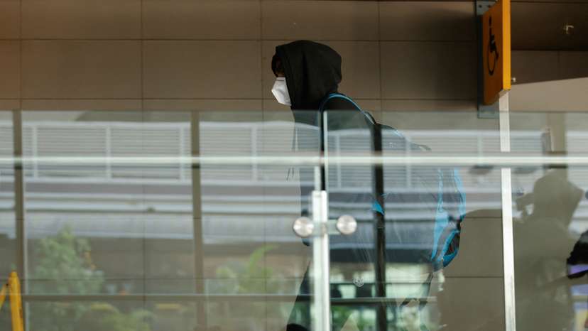 A passenger from Nicaragua bound Airbus A340 flight that was grounded in France on suspicion of human trafficking, leaves the Chhatrapati Shivaji Maharaj International Airport, in Mumbai