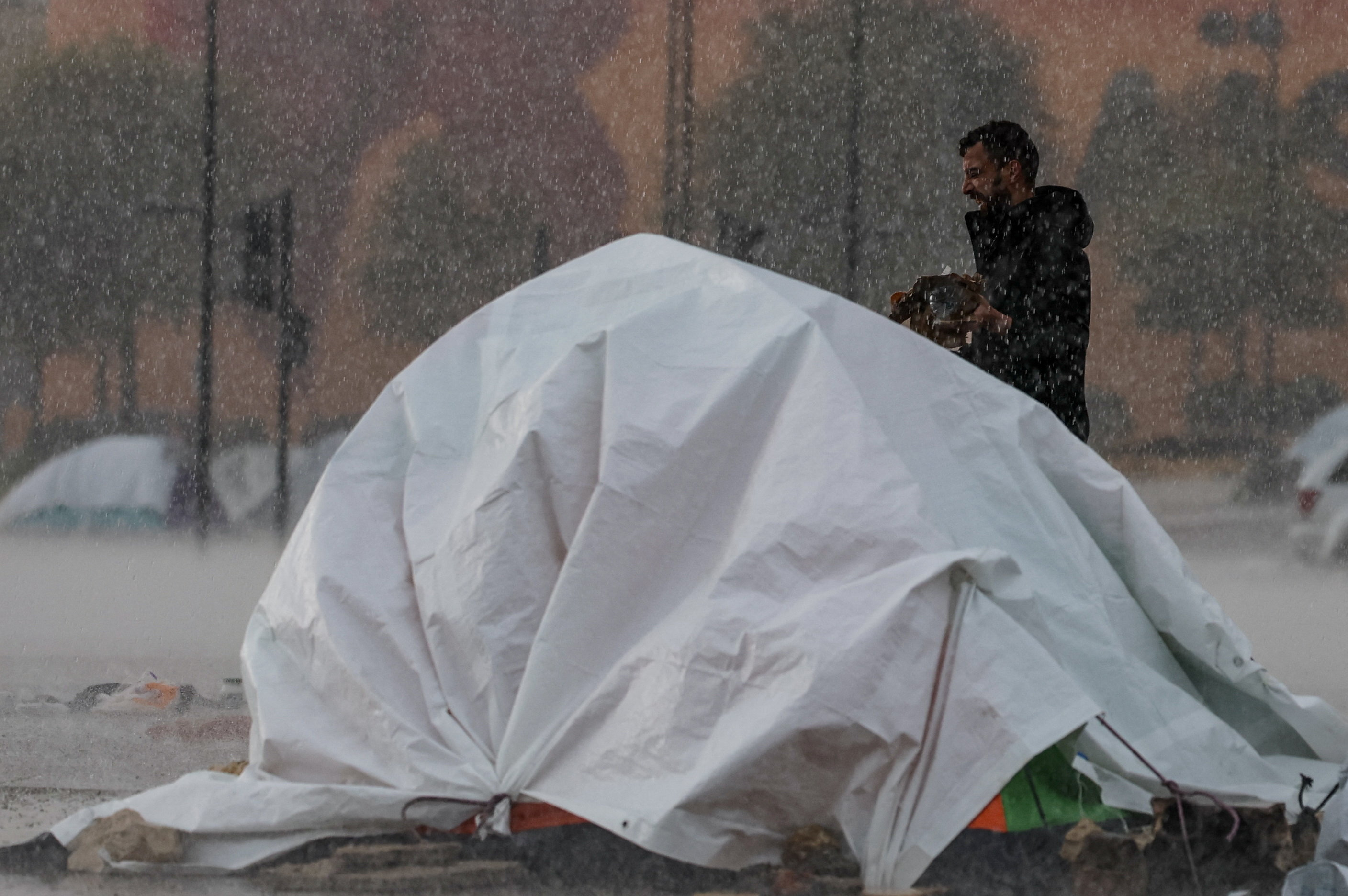 Displaced people set up tents in Beirut