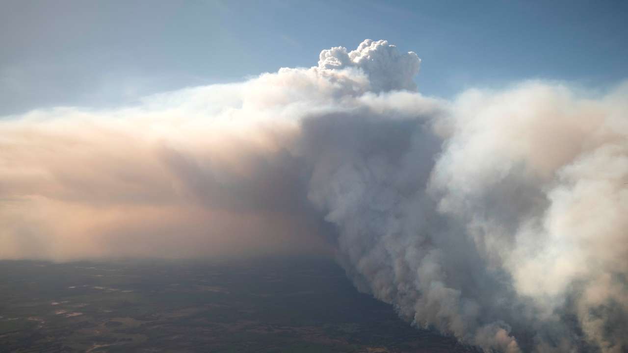 The Chuckegg Creek wildfire burns out of control in the High Level Forest Area