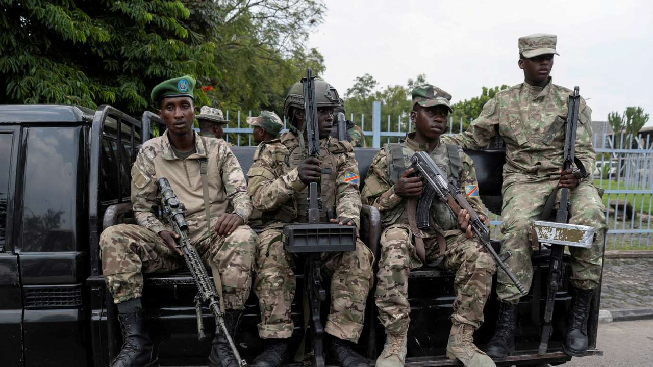 FILE PHOTO: M23 rebels escort FDLR to Rwandan border for repatriation after capture in Goma