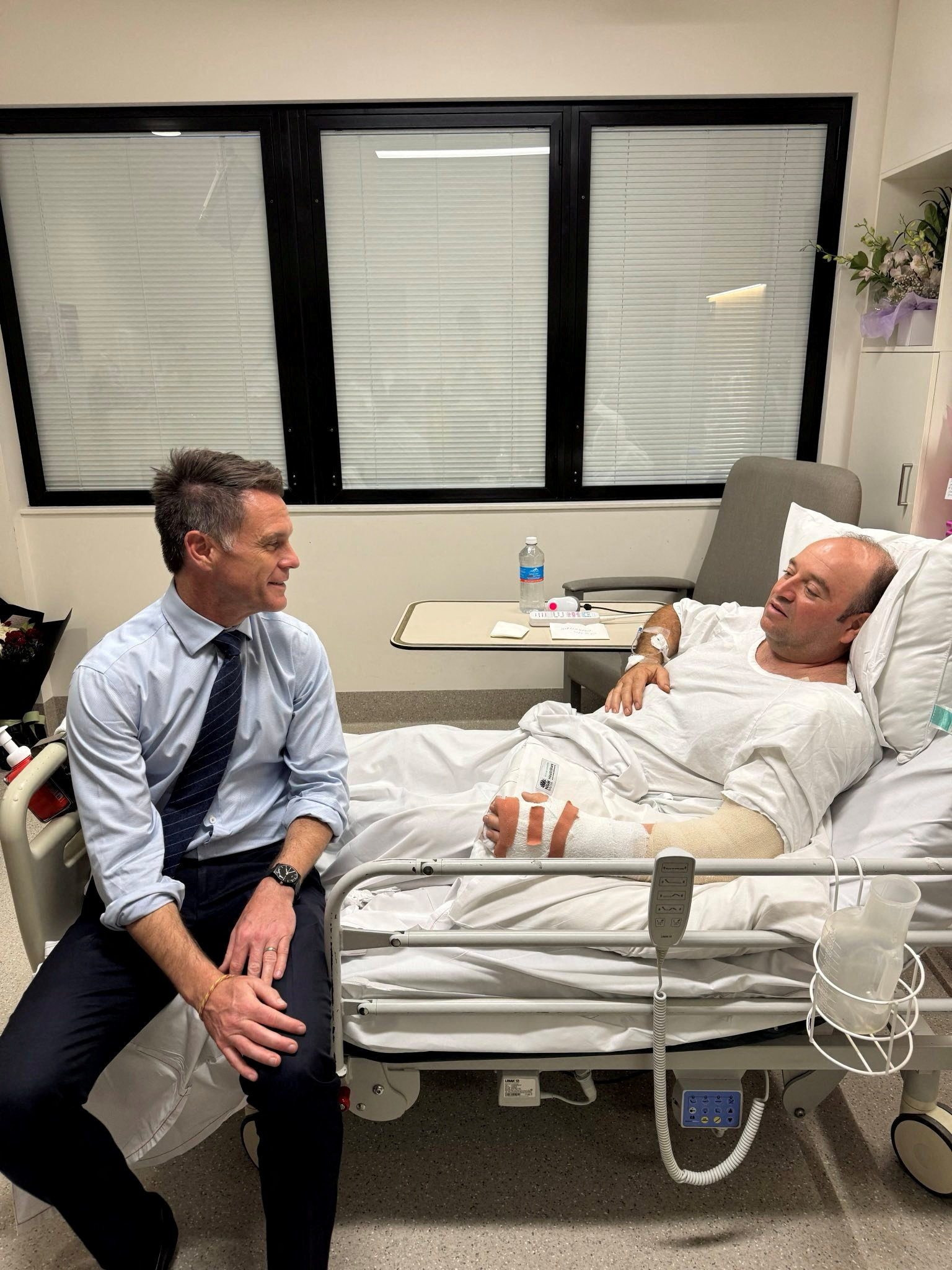 NSW Premier Chris Minns visits Ahmed al Ahmed at the hospital, in Sydney