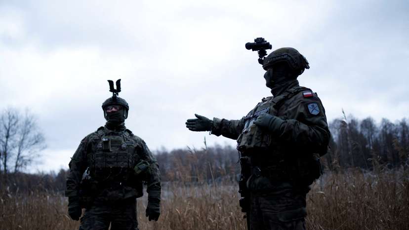 FILE PHOTO: Polish soldiers from 18th Mechanized Division guard Poland's border with Belarus as a part of the operation 'Secure Podlasie'