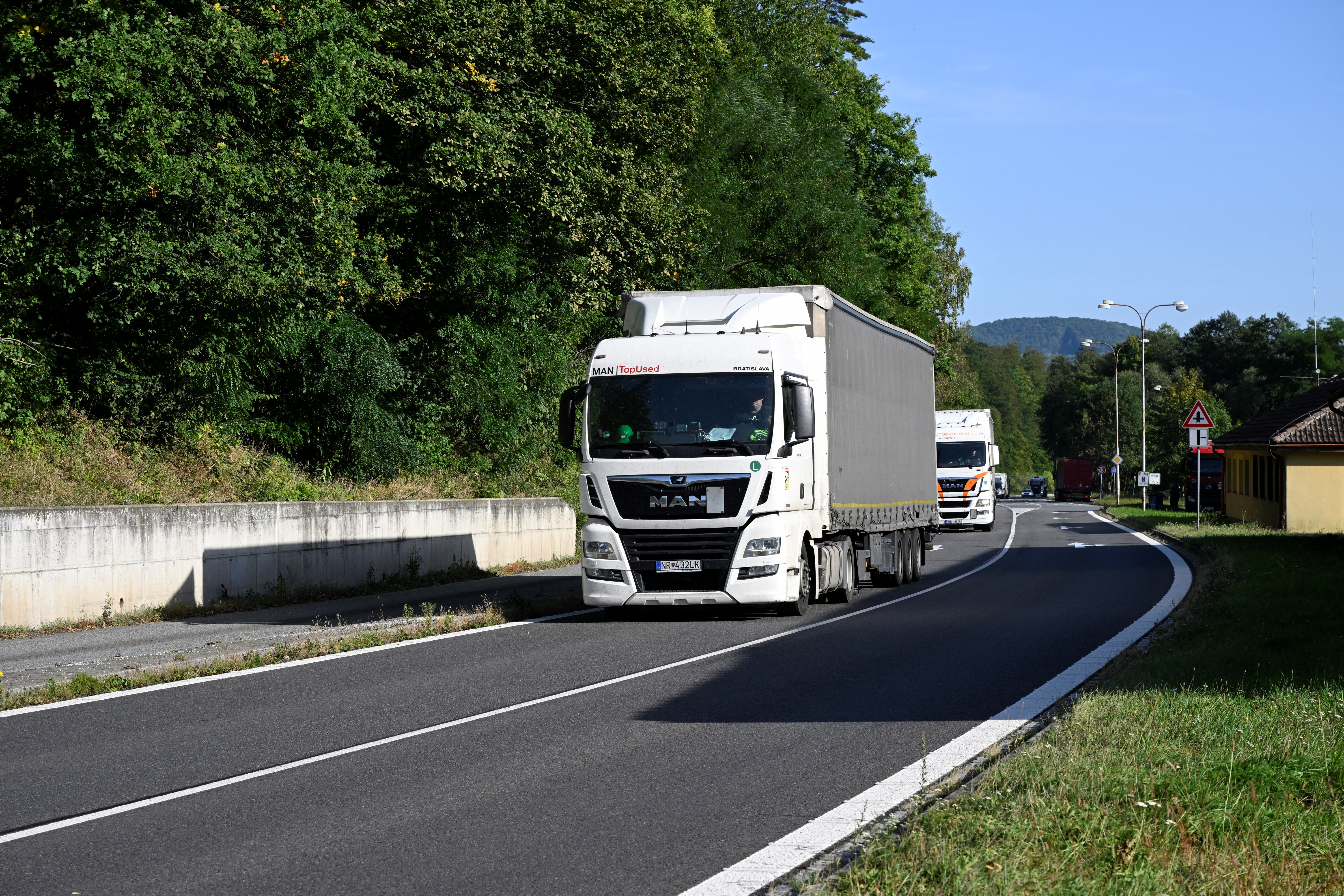 Truck passes border plaques at Czech-Slovak border in Stary Hrozenkov