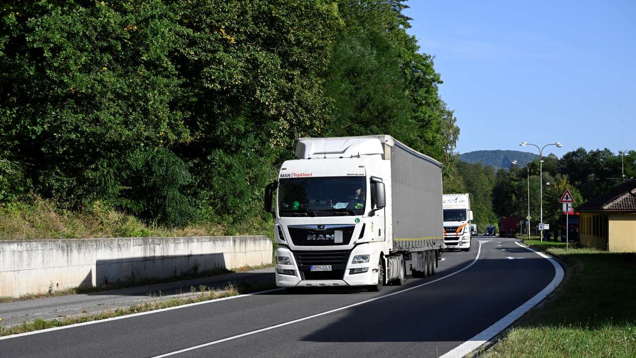 Truck passes border plaques at Czech-Slovak border in Stary Hrozenkov