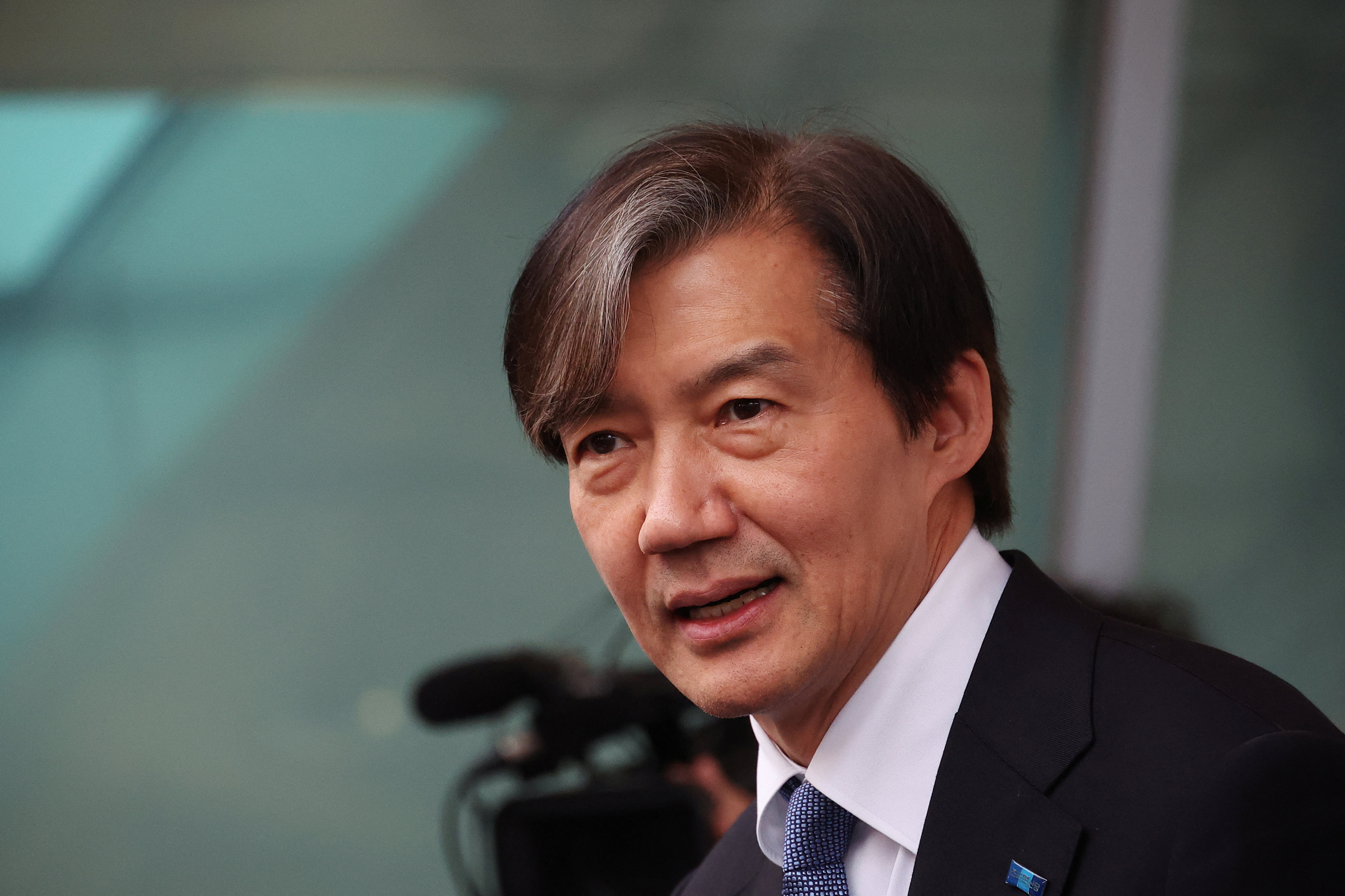 Cho Kuk, leader of Rebuilding Korea Party answers to reporters' question during a campaign rally for for upcoming 22nd parliamentary election, in Seoul