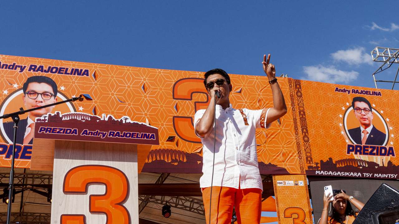 Supporters of Madagascar's outgoing president and candidate for re-election Rajoelina attend his final presidential campaign rally in Antananarivo