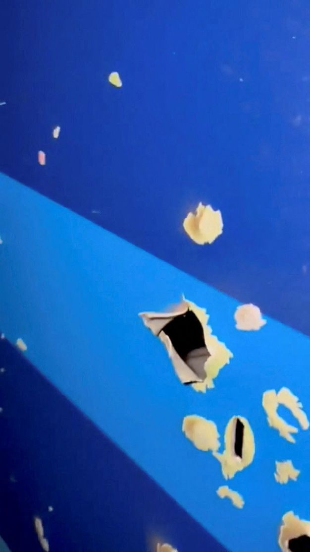 Damages in the wreckage of an Azerbaijan Airlines' Embraer passenger plane that crashed near Aktau