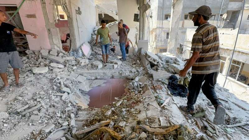 Aftermath of an Israeli strike on a house in Gaza City