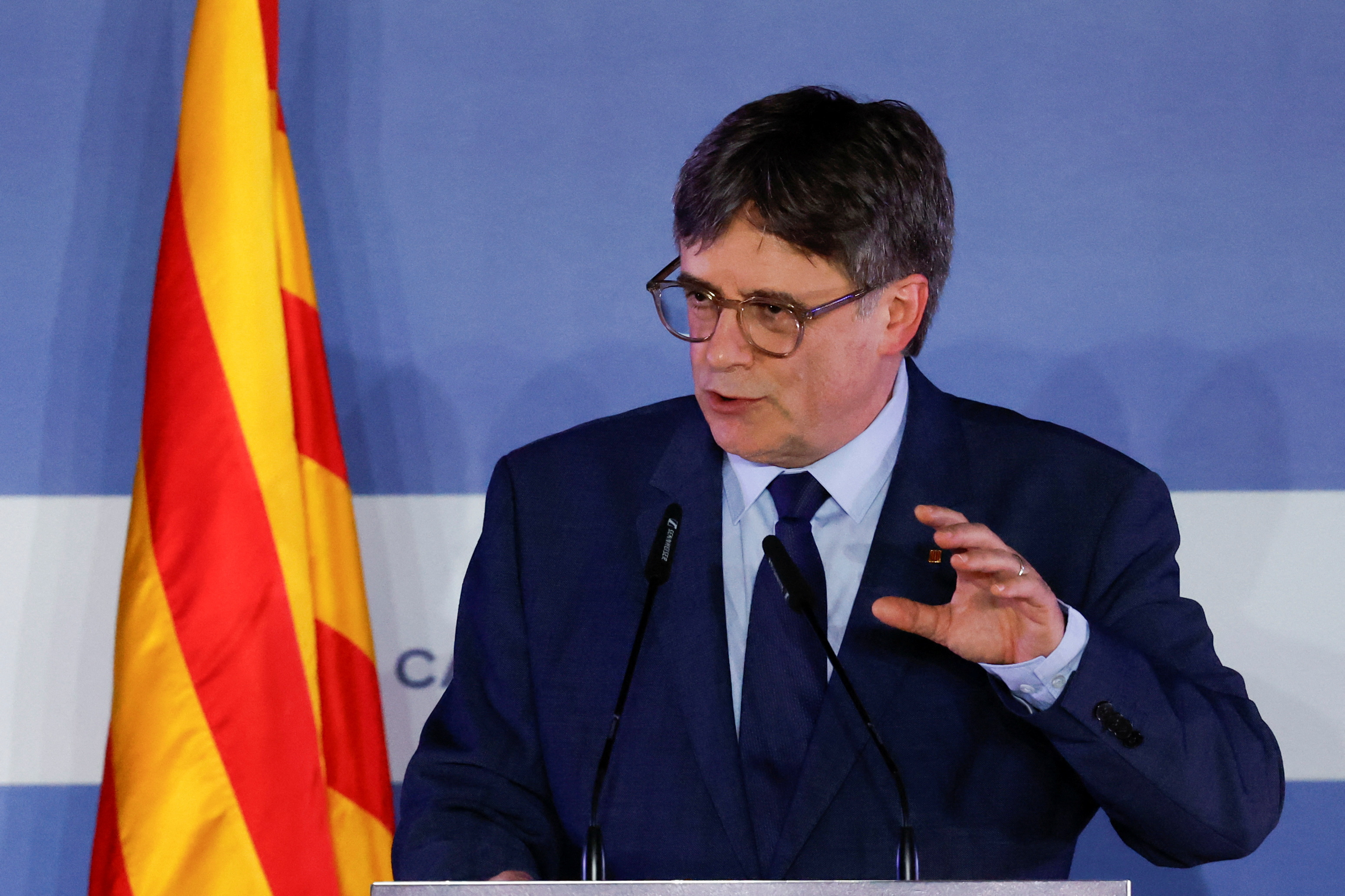 Catalan separatist leader Carles Puigdemont gives a press conference in Elne
