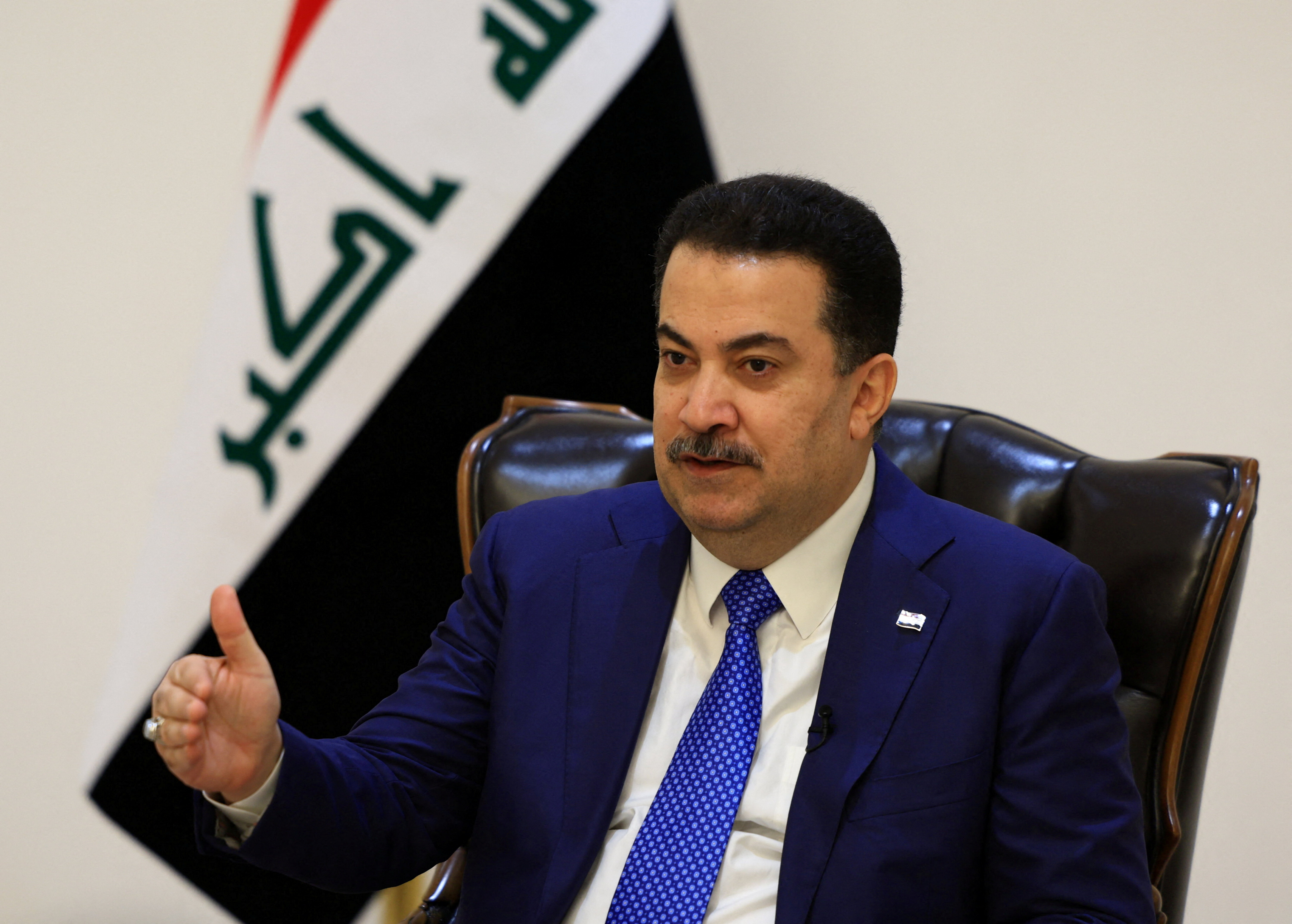 Iraqi Prime Minister Mohammed Shia al-Sudani speaks during an interview with Reuters in Baghdad