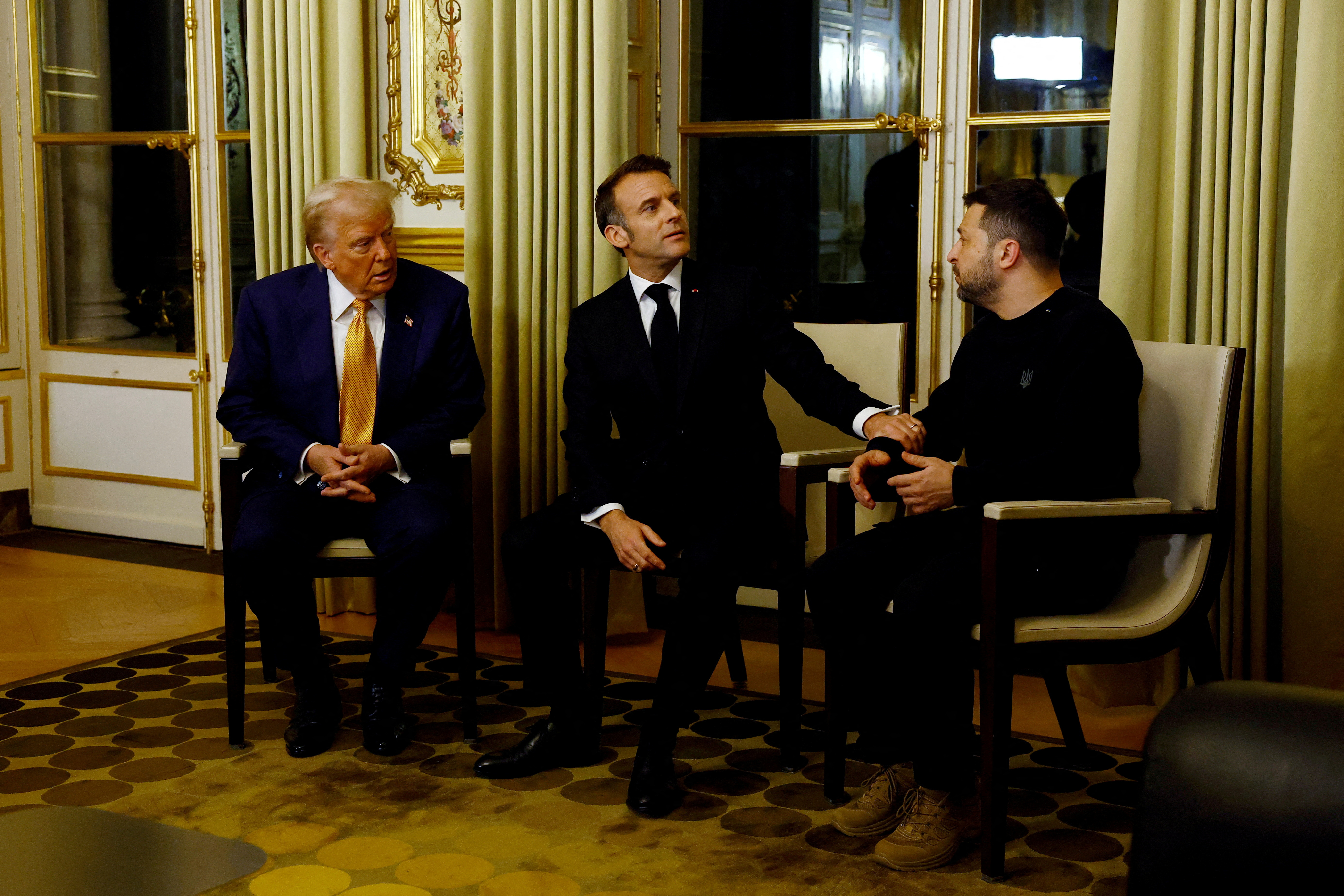 FILE PHOTO: French President Macron meets U.S. President-elect Trump and Ukraine's President Zelenskiy in Paris