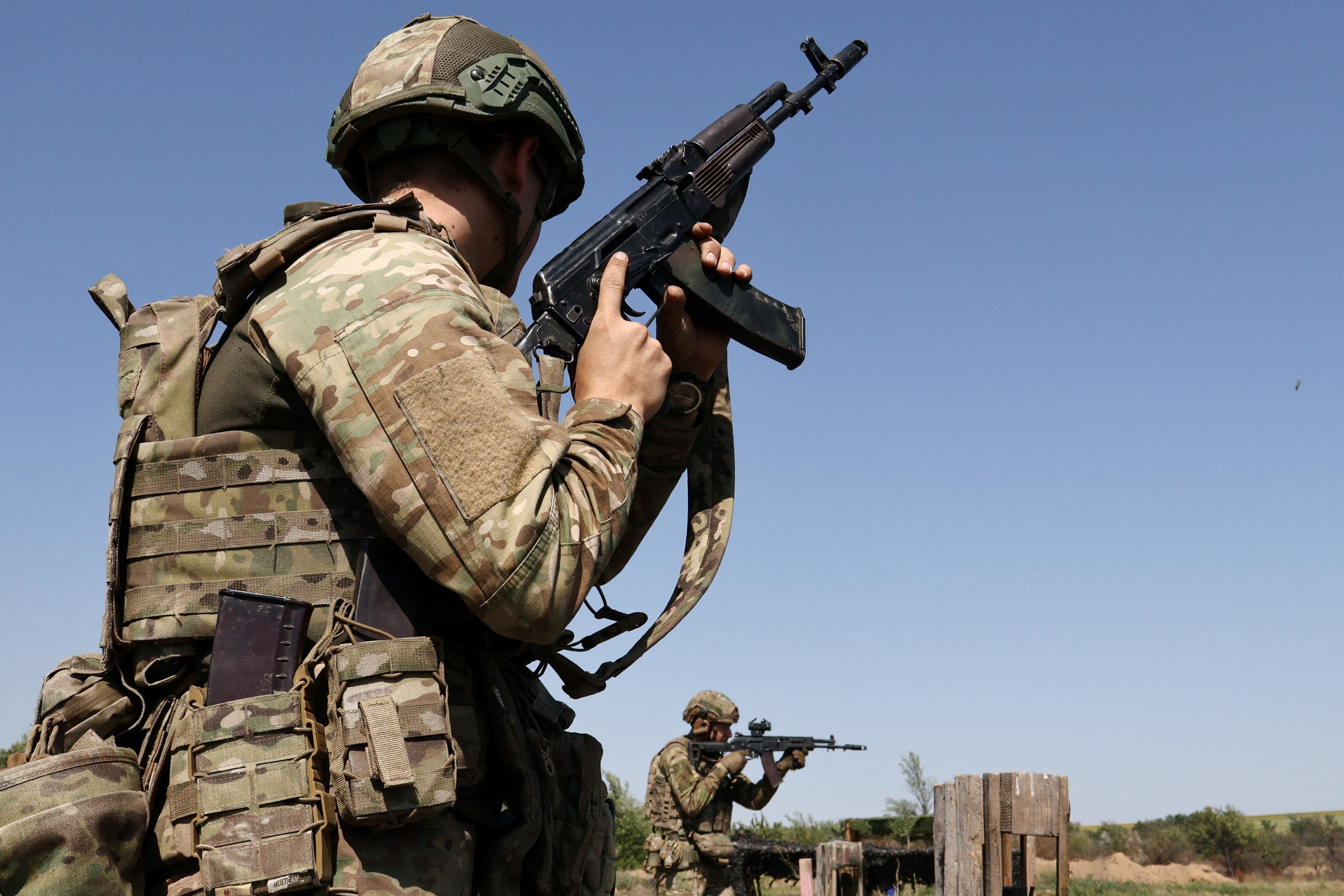 FILE PHOTO: Ukrainian service members attend a military drill near a frontline in Zaporizhzhia region