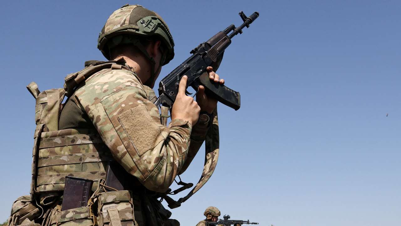 FILE PHOTO: Ukrainian service members attend a military drill near a frontline in Zaporizhzhia region