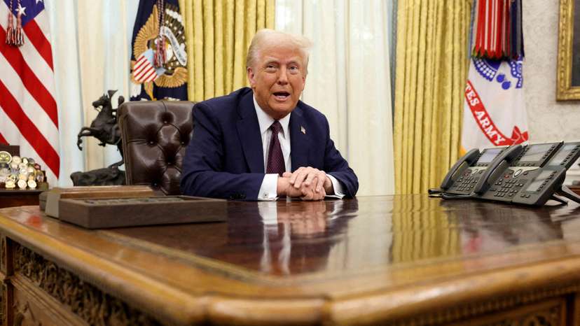 FILE PHOTO: U.S. President Trump signs an executive order in the Oval Office, at the White House